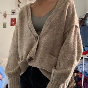 light brown sweater